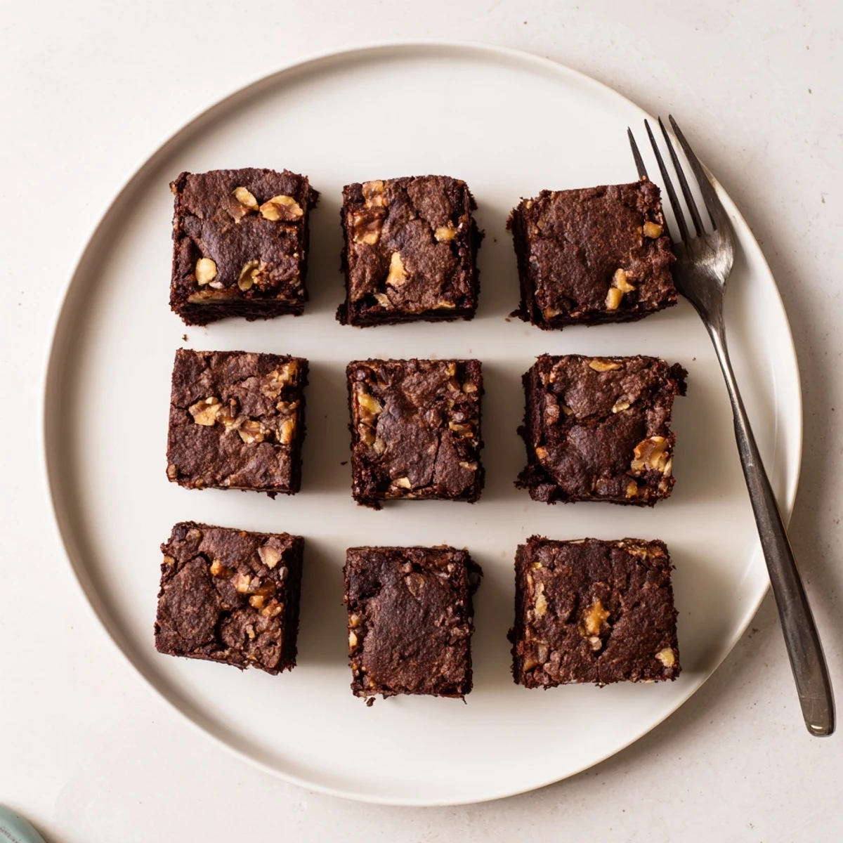Decadent Zero-Waste Brownies using nut-milk pulp, topped with rich chocolate chips.  