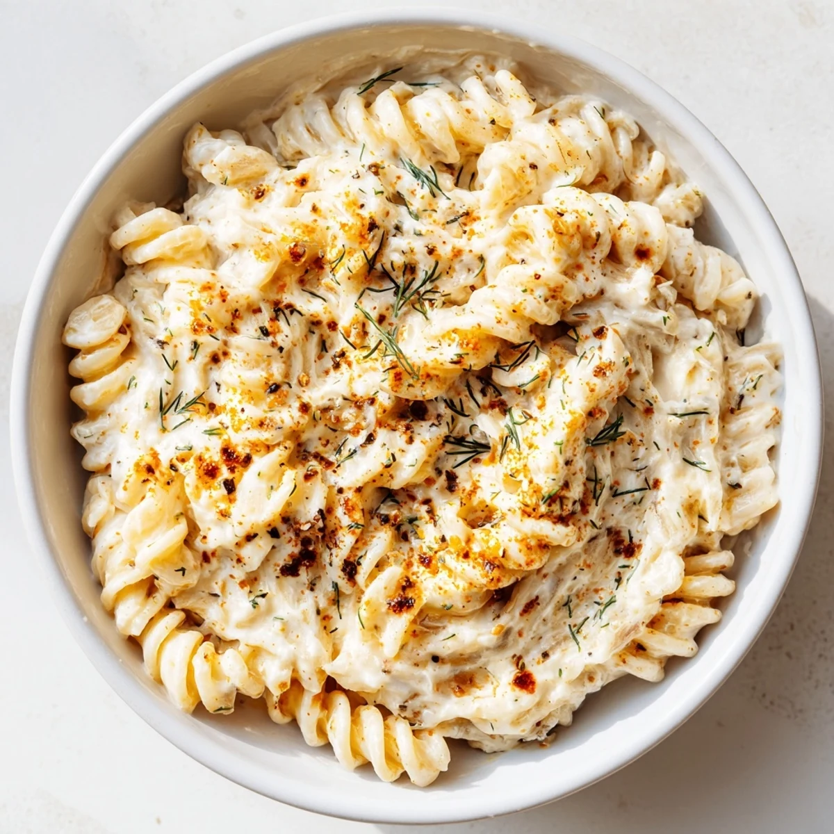 Creamy Turkish Yogurt Pasta, swirled with garlic-infused yogurt and vibrant red spiced butter.