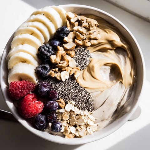 A colorful, satisfying Protein Peanut Butter Breakfast Bowl, perfect for a high-protein start.