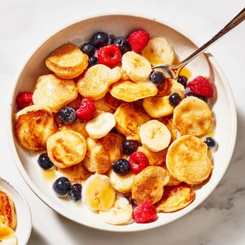 Delicious bite-sized pancakes, crispy outside and fluffy inside, perfect for breakfast!  