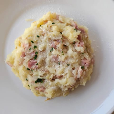 Imagine the textures: flavorful, fried Depression-Era Ham & Potato Patties with a light dusting of flour.