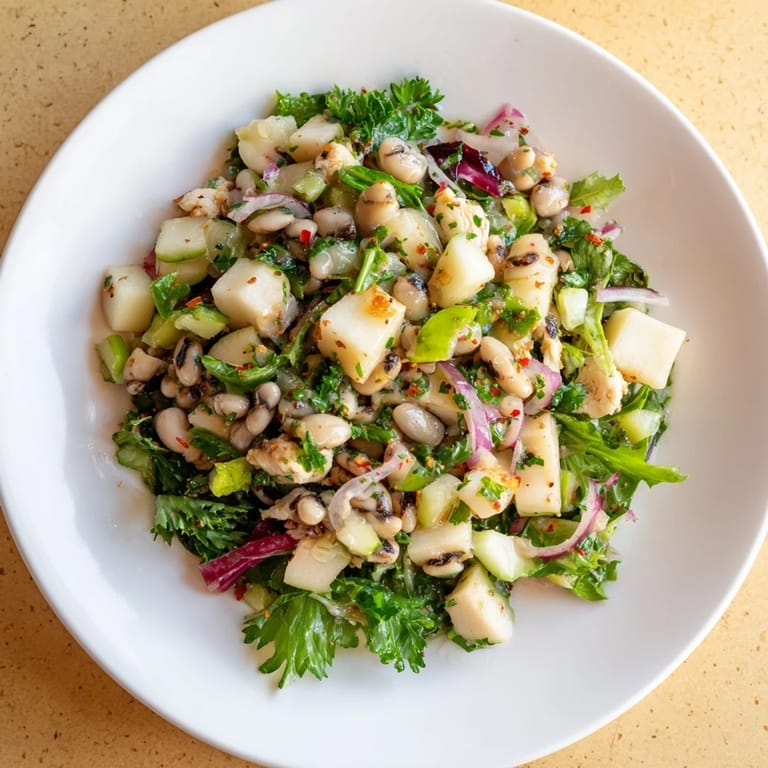 This Chicken and Apple New Years Luck Salad displays vibrant colors, with tender chicken and crunchy apples.