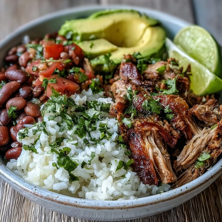 Fresh pico de gallo, creamy avocado slices, and chopped cilantro garnish the Mexican dish.