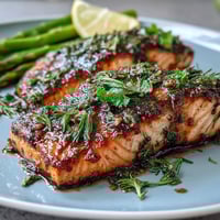 Herb Roasted Salmon with Asparagus, a vibrant dish with fresh herbs and tender spring vegetables.
